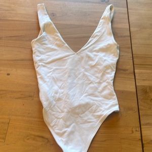 Babaton XXS white v front and back thong bodysuit from Aritzia